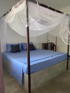 En eller flere senge i et værelse på Relax Corner + 16 billeder