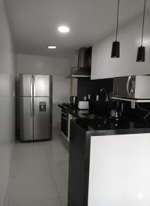 Køkken eller tekøkken på Casa Completa Próximo ao Aeroporto de Maceió