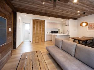 a living room with a couch and a table at -new-SHELL THE THIRD in Kamakura +44 photos