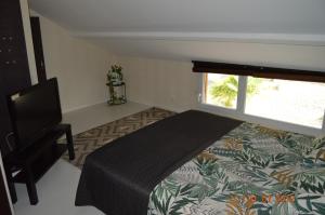 Postel nebo postele na pokoji v ubytování 10 min from Futuroscope, contemporary villa! + 17 fotografií