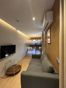 TV a/nebo společenská místnost v ubytování The Warehouse Chiang Mai