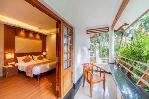 Giường trong phòng chung tại Crown Valley Thekkady +132 ảnh