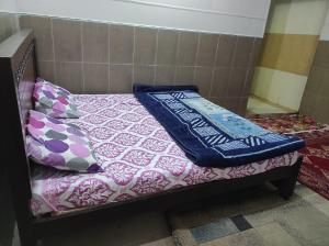 En eller flere senge i et værelse på Vista Stay, Ghora Gali