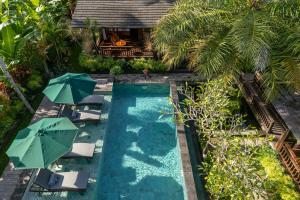 Bazén v ubytování Emana Abian Taksu nebo v jeho okolí