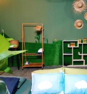 Postel nebo postele na pokoji v ubytování Homestay GÁC MƠ Vũng Tàu