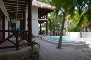 Bazén v ubytování Casa Iguana Holbox - Beachfront Hotel nebo v jeho okolí