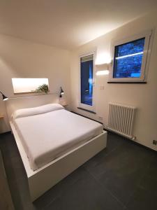 Giường trong phòng chung tại La BouganVilla