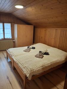 Postel nebo postele na pokoji v ubytování Haus Obergoms