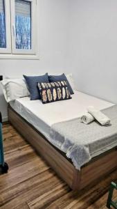 En eller flere senge i et værelse på Passive House con piscina y jardín privado