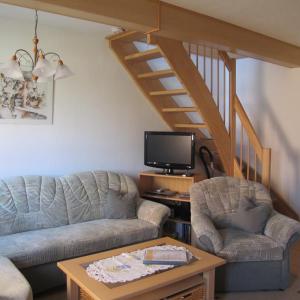 Khu vực ghế ngồi tại Ferienwohnungen Pustane