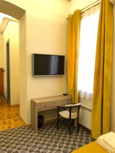 TV a/nebo společenská místnost v ubytování RBH Studios