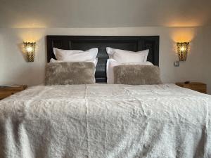 Giường trong phòng chung tại Éco-domaine Gîtes et Spa - Mer, Nature & Confort - Côte d'Opale +26 ảnh