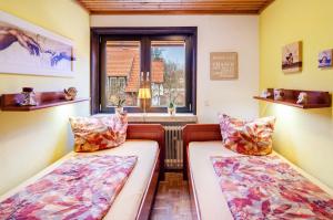 En eller flere senge i et værelse på Ferienwohnung Bergblick