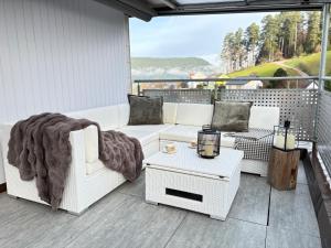 Posezení v ubytování Panorama Auszeit Schwarzwald Kamin Traumhaftes Premium Apartment