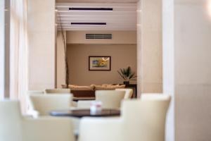 Et opholdsområde på HVD Lotos Hotel - Private Beach & Free Parking