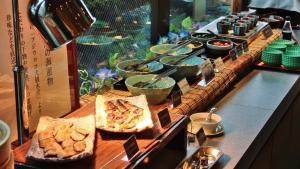 a buffet with many different types of food on a counter at Koriyama View Hotel Annex in Koriyama +55 photos