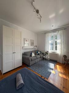 En eller flere senge i et værelse på Bankowa 8 Guest Rooms