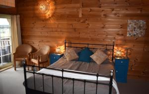 Llit o llits en una habitació de Trésor en Bois 16 fotos més