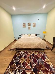 En eller flere senge i et værelse på Nadantar Stays