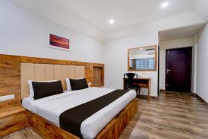 Giường trong phòng chung tại Hotel O OZONE Residency