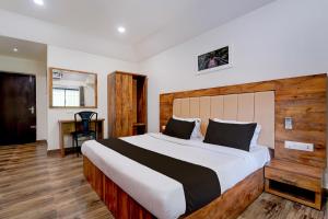 Giường trong phòng chung tại Hotel O OZONE Residency