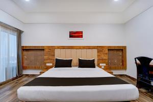 Giường trong phòng chung tại Hotel O OZONE Residency