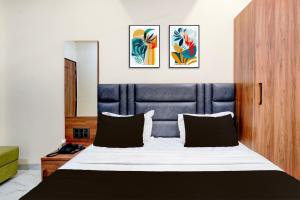 Giường trong phòng chung tại Hotel O Kant