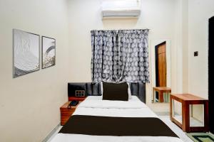 Giường trong phòng chung tại Hotel O Kant