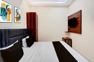 Giường trong phòng chung tại Hotel O Kant