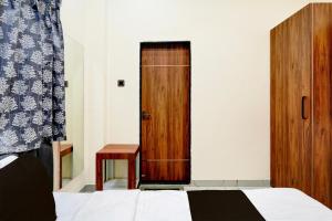 Giường trong phòng chung tại Hotel O Kant +21 ảnh