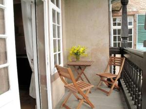 En balkon eller terrasse på Chambres d'hôtes Le Clos Saint Léonard