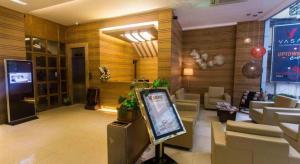 TV a/nebo společenská místnost v ubytování Nordic Hotels