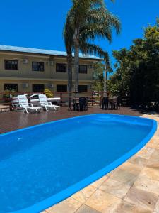 Swimmingpoolen hos eller tæt på Pousada Samburá