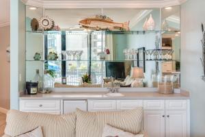 a bathroom with a sink and a mirror at Phoenix on the Bay Unit 1110 in Orange Beach
