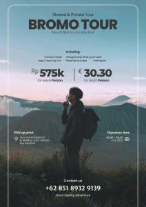 a poster of a person taking a picture of a mountain at Bromo Breeze Malang in Malang