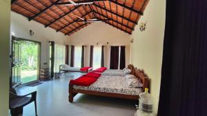 Postel nebo postele na pokoji v ubytování Heritage Homestay