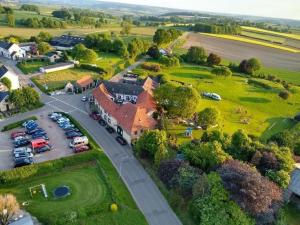 an aerial view of a village with a parking lot at 18 4p Authentic Cosy Cottage in Voerendaal