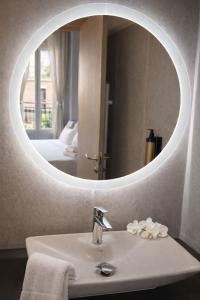 Vannas istaba naktsmītnē Hotel Cantore +28 fotogrāfijas