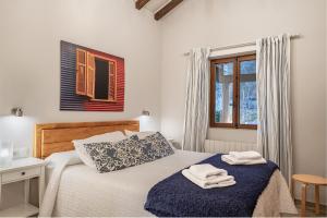 Postel nebo postele na pokoji v ubytování Apartamento El Olivo