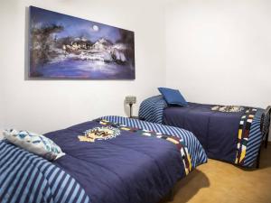 En eller flere senge i et værelse på House alpujarra caratunas