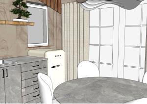 eine Küche mit einem Tisch und einem Kühlschrank in der Unterkunft De Hombrake, Bed & Breakfast in Wilp