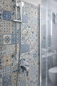 Vannas istaba naktsmītnē Hotel Cantore