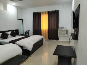 Afbeelding uit fotogalerij van Hotel Temple View in Bodh Gaya