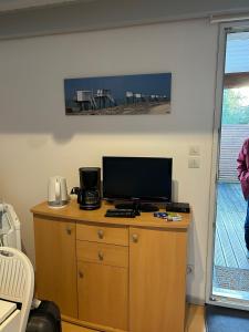 TV a/nebo společenská místnost v ubytování La Berguerie À Oléron + 36 fotografií