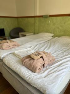 Postel nebo postele na pokoji v ubytování Spa For Hjo