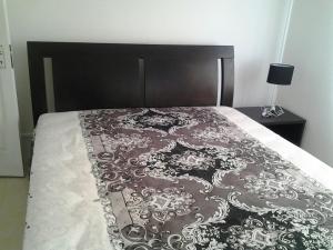 Postel nebo postele na pokoji v ubytování Le Paradisier Guest House