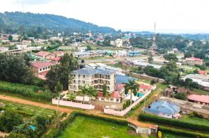 an aerial view of a town with houses and trees at satelite view hotel in Webuye