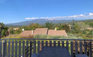 a view from the balcony of a house at Gîte au Ventoux in Villes-sur-Auzon