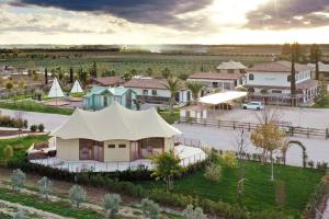 an aerial view of a small town with houses at Tresort Oil Glamping in Principina Terra