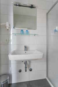 Kúpeľňa v ubytovaní Turmöl Hotel